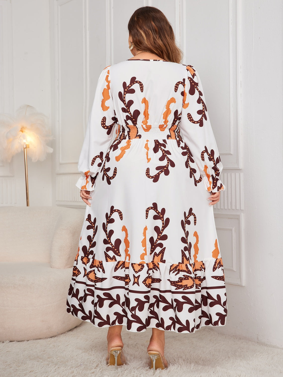 Plus Size Printed Surplice Flounce Sleeve Dress - ships from supplier in approximately 10 business days